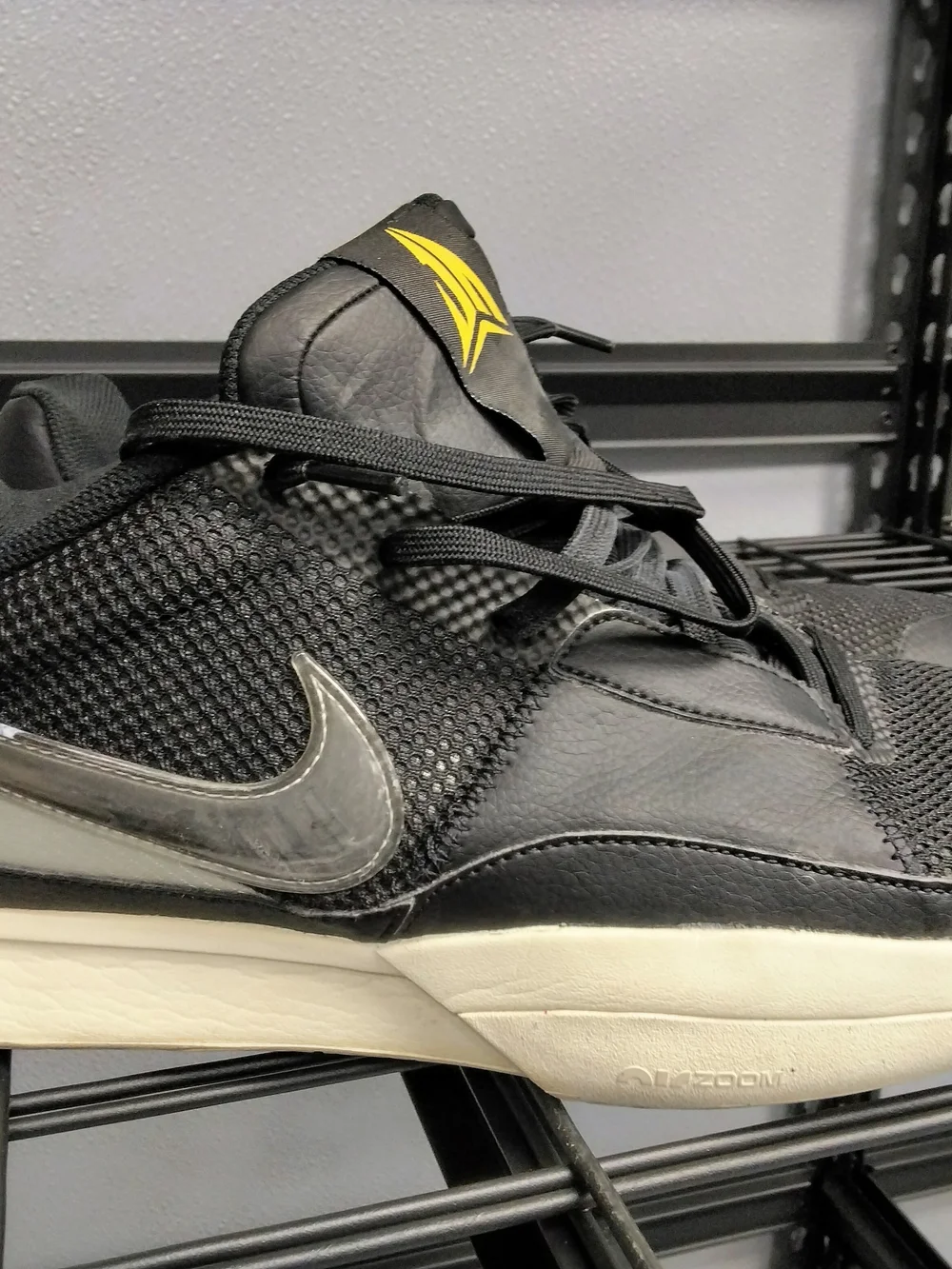 Nike Men’s Black Athletic Sneakers with Yellow Accent